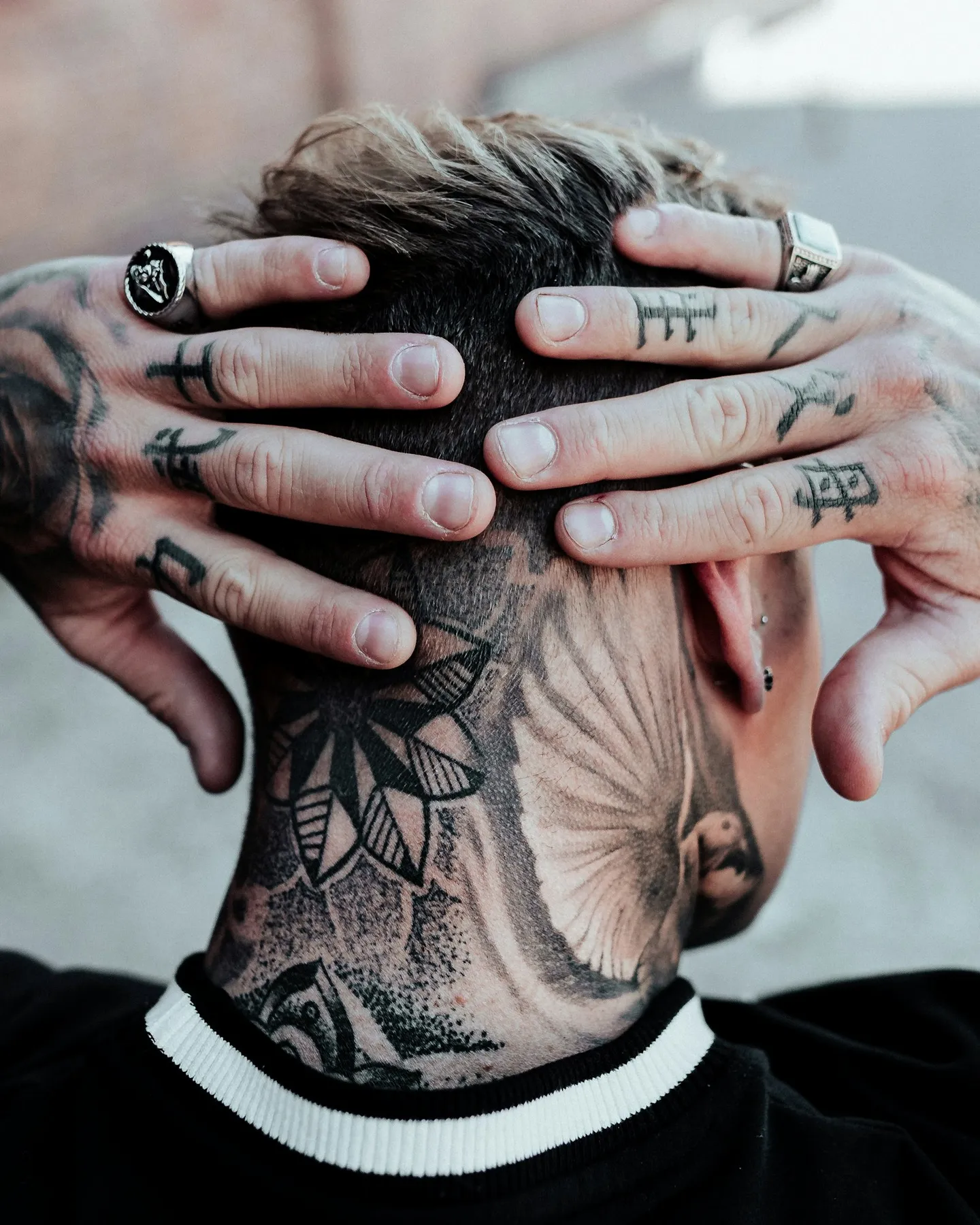 A heavily tattooed back