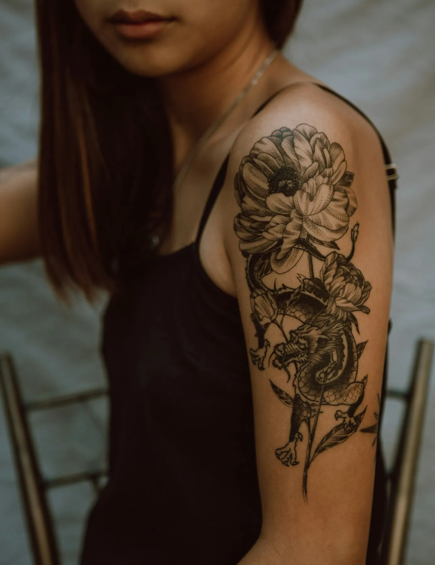 Detailed shoulder tattoo work