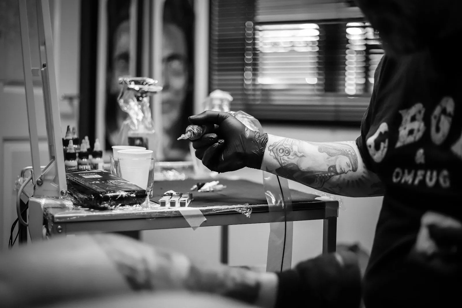 A tattoo studio with artists at work